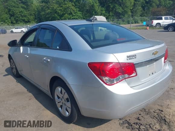 2015 Chevrolet Cruze LS with VIN 1G1PA5SG4F7191854, listed as a IAAI auction lot 42942106 with 56,813 mi miles and . Bid and sale history available at DreamBid. Image 3.