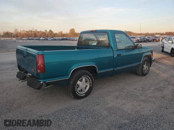 1996 GMC Sierra 1500 с VIN 1GTEC14W5TZ533415, выставлен на аукционе Copart как лот 82287484 с пробегом 442 981 миль миль и Списание • Salvage title. История ставок и продаж доступна на DreamBid. Изображение 3.