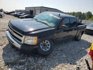 2010 Chevrolet Silverado 1500 LS with VIN 3GCRKREA6AG134371, listed as a Copart auction lot 65418405 with 200,021 mi miles and Salvage title. Bid and sale history available at DreamBid. Image 1.