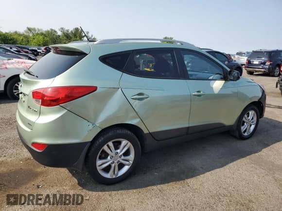 2011 Hyundai Tucson Limited with VIN KM8JUCAC5BU143200, listed as a Copart auction lot 59398055 with 217,552 mi miles and Clean title. Bid and sale history available at DreamBid. Image 3.