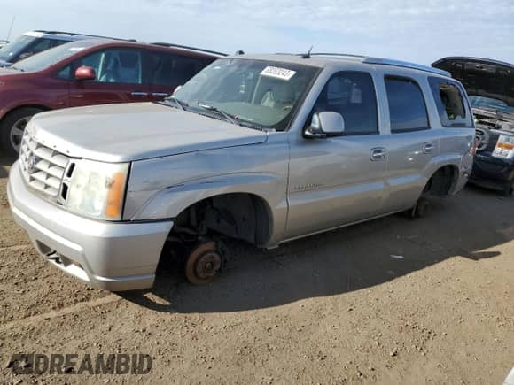 2004 Cadillac Escalade z VIN 1GYEK63N44R216455, wystawiony jako Copart lot #68263243 z przebiegiem 230 087 mil mil oraz Nie do naprawy • Non repairable. Historia ofert i sprzedaży dostępna na DreamBid. Obrazek 1.