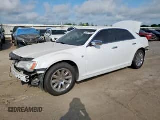 2013 Chrysler 300 C with VIN 2C3CCAETXDH661618, listed as a Copart auction lot 62320905 with 129,094 mi miles and Salvage title. Bid and sale history available at DreamBid. Image 1.