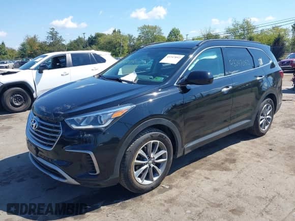 2017 Hyundai Santa Fe SE with VIN KM8SMDHF1HU225217, listed as a IAAI auction lot 43247052 with 69,051 mi miles and . Bid and sale history available at DreamBid. Image 2.