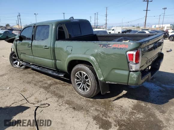 2022 Toyota Tacoma SR5 z VIN 3TMDZ5BN9NM133972, wystawiony jako Copart lot #50102025 z przebiegiem 12 598 mil mil oraz Szkoda całkowita • Salvage title. Historia ofert i sprzedaży dostępna na DreamBid. Obrazek 2.