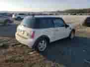 2006 MINI Hardtop with VIN WMWRC33536TK66138, listed as a Copart auction lot 81620335 with 128,877 mi miles and Salvage title. Bid and sale history available at DreamBid. Image 3.