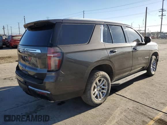 2021 Chevrolet Tahoe LT с VIN 1GNSCNKD6MR121413, выставлен на аукционе Copart как лот 72018235 с пробегом 101 408 миль миль и Списание • Salvage title. История ставок и продаж доступна на DreamBid. Изображение 3.