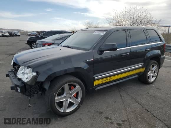 2008 Jeep Grand Cherokee SRT-8 z VIN 1J8HR78398C214004, wystawiony jako Copart lot #48760375 z przebiegiem 165 318 mil mil oraz Szkoda całkowita • Salvage title. Historia ofert i sprzedaży dostępna na DreamBid. Obrazek 1.