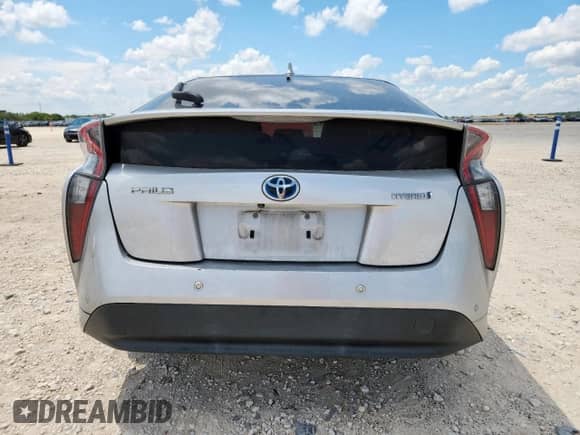2018 Toyota Prius Two с VIN JTDKBRFU8J3058424, выставлен на аукционе Copart как лот 70436275 с пробегом 102 357 миль миль и Списание • Salvage title. История ставок и продаж доступна на DreamBid. Изображение 6.