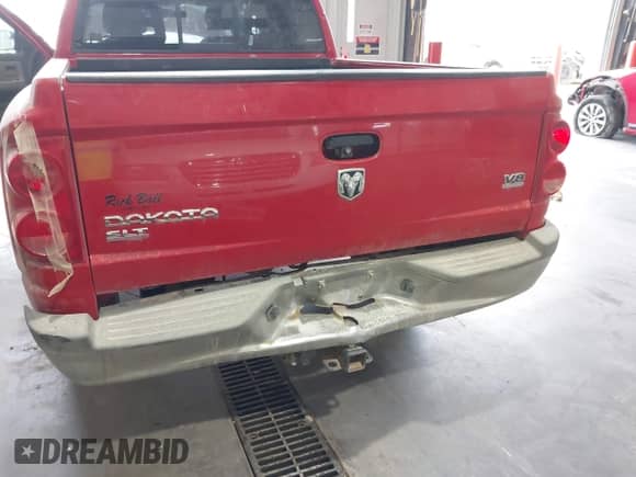 2005 Dodge Dakota SLT with VIN 1D7HW48N65S366085, listed as a IAAI auction lot 43206475 with 187,820 mi miles and . Bid and sale history available at DreamBid. Image 6.