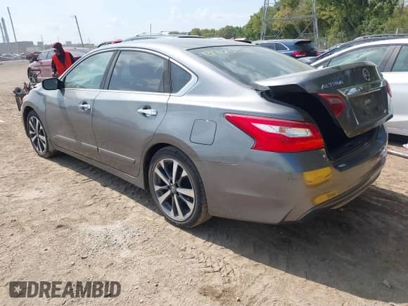 2016 Nissan Altima S with VIN 1N4AL3AP1GC205494, listed as a IAAI auction lot 43191701 with 92,894 mi miles and . Bid and sale history available at DreamBid. Image 3.