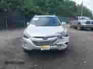 2014 Hyundai Tucson SE with VIN KM8JU3AG5EU831589, listed as a IAAI auction lot 42709097 with 147,199 mi miles and . Bid and sale history available at DreamBid. Image 13.