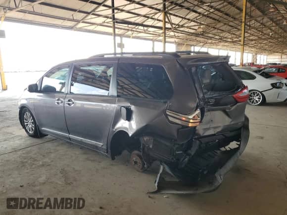 2015 Toyota Sienna XLE with VIN 5TDYK3DC3FS672692, listed as a Copart auction lot 71738875 with 147,537 mi miles and Salvage title. Bid and sale history available at DreamBid. Image 2.