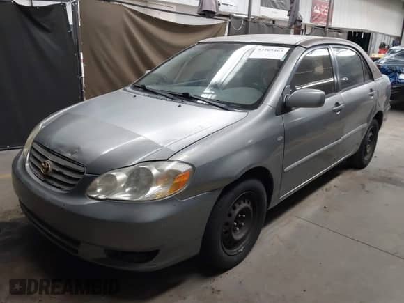 2004 Toyota Corolla CE with VIN JTDBR32E342029415, listed as a IAAI auction lot 43165463 with 210,597 mi miles and . Bid and sale history available at DreamBid. Image 2.