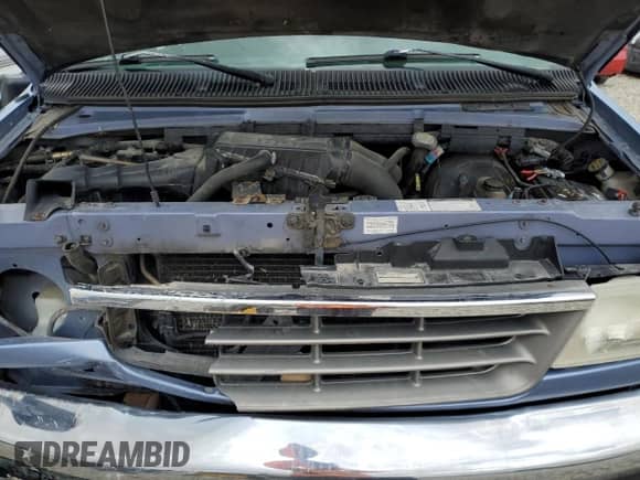 1995 Ford Econoline Cargo with VIN 1FBHE31H4SHA93723, listed as a Copart auction lot 56571395 with 204,856 mi miles and Salvage title. Bid and sale history available at DreamBid. Image 12.