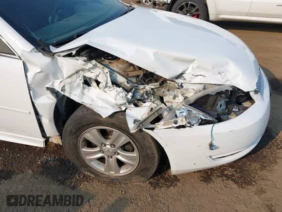 2013 Chevrolet Impala LS with VIN 2G1WF5E35D1240348, listed as a IAAI auction lot 43131336 with 137,558 mi miles and . Bid and sale history available at DreamBid. Image 6.