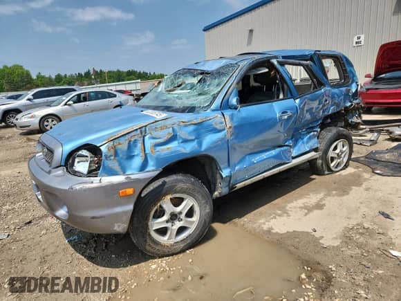 2004 Hyundai Santa Fe GLS z VIN KM8SC73E14U663801, wystawiony jako Copart lot #63306745 z przebiegiem Nie podano mil oraz Nie do naprawy • Non repairable. Historia ofert i sprzedaży dostępna na DreamBid. Obrazek 1.