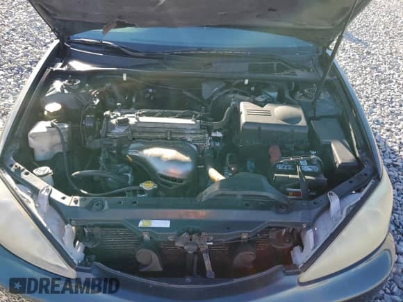 2002 Toyota Camry LE z VIN 4T1BE32KX2U635146, wystawiony jako Copart lot #82499135 z przebiegiem 200 352 mil mil oraz Szkoda całkowita • Salvage title. Historia ofert i sprzedaży dostępna na DreamBid. Obrazek 11.