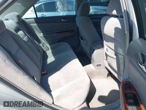 2002 Toyota Camry XLE with VIN JTDBF30K220003205, listed as a IAAI auction lot 43326504 with 180,560 mi miles and . Bid and sale history available at DreamBid. Image 8.