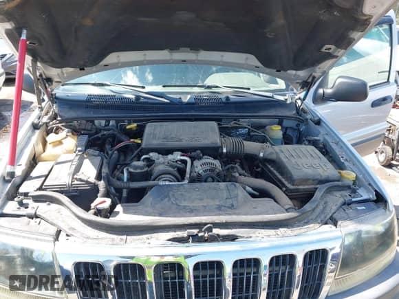 2003 Jeep Grand Cherokee Laredo z VIN 1J4GW48N83C608270, wystawiony jako IAAI lot #42721644 z przebiegiem 122 514 mil mil oraz . Historia ofert i sprzedaży dostępna na DreamBid. Obrazek 10.