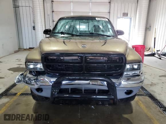 2000 Dodge Dakota Sport z VIN 1B7GG22NXYS654843, wystawiony jako Copart lot #47562755 z przebiegiem 191 868 mil mil oraz Szkoda całkowita • Salvage title. Historia ofert i sprzedaży dostępna na DreamBid. Obrazek 5.