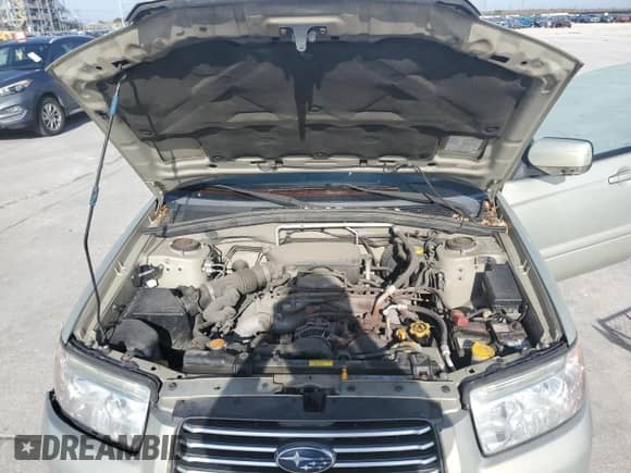 2007 Subaru Forester X with VIN JF1SG65667H707349, listed as a Copart auction lot 43974994 with 99,437 mi miles and Salvage title. Bid and sale history available at DreamBid. Image 12.