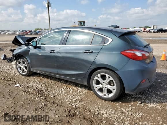 2017 Chevrolet Cruze Premier with VIN 3G1BF6SM7HS519540, listed as a Copart auction lot 71027975 with 173,471 mi miles and Salvage title. Bid and sale history available at DreamBid. Image 2.