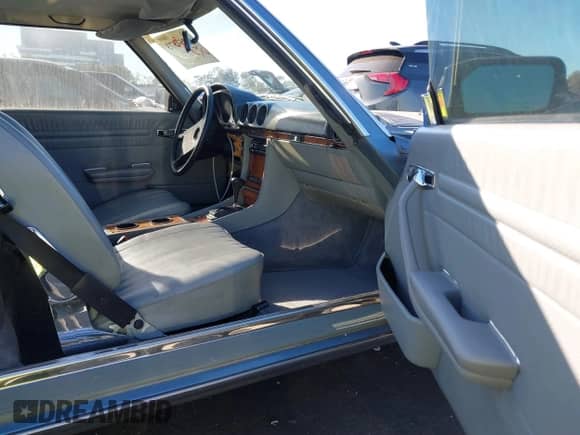 1985 Mercedes-Benz 380 with VIN WDBBA45C6FA020254, listed as a IAAI auction lot 41254573 with 74,344 mi miles and . Bid and sale history available at DreamBid. Image 5.