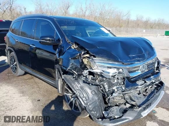 2020 Honda Pilot Touring 7-Passenger z VIN 5FNYF5H64LB006073, wystawiony jako IAAI lot #41750282 z przebiegiem 73 214 mil mil oraz . Historia ofert i sprzedaży dostępna na DreamBid. Obrazek 1.