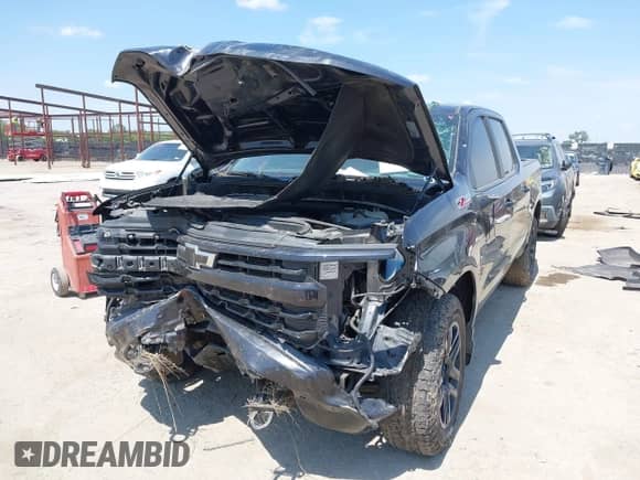 2024 Chevrolet Silverado 1500 RST with VIN 1GCUDEED8RZ166452, listed as a IAAI auction lot 43095521 with 50,889 mi miles and . Bid and sale history available at DreamBid. Image 2.