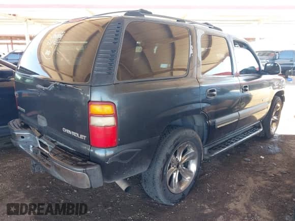 2003 Chevrolet Tahoe LT z VIN 1GNEC13Z03R286579, wystawiony jako IAAI lot #41872493 z przebiegiem 236 001 mil mil oraz . Historia ofert i sprzedaży dostępna na DreamBid. Obrazek 4.