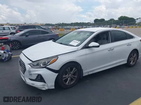 2018 Hyundai Sonata Limited with VIN 5NPE34AF9JH636024, listed as a IAAI auction lot 42562948 with 60,828 mi miles and . Bid and sale history available at DreamBid. Image 2.