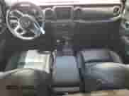 2021 Jeep Wrangler Unlimited Sahara High Altitude with VIN 1C4HJXEG2MW620527, listed as a Copart auction lot 72848894 with 65,598 mi miles and Salvage title. Bid and sale history available at DreamBid. Image 8.