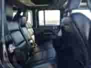 2021 Jeep Wrangler Unlimited Rubicon with VIN 1C4HJXFG1MW649077, listed as a IAAI auction lot 43496520 with 52,136 mi miles and . Bid and sale history available at DreamBid. Image 8.