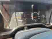 2002 Jeep Wrangler Sahara z VIN 1J4FA59S62P706936, wystawiony jako Copart lot #86420315 z przebiegiem 117 025 mil mil oraz Szkoda całkowita • Salvage title. Historia ofert i sprzedaży dostępna na DreamBid. Obrazek 9.