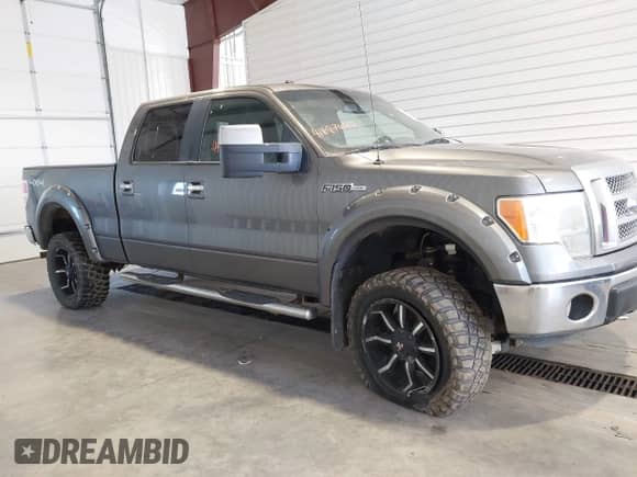 2012 Ford F-150 Lariat with VIN 1FTFW1E64CFA50624, listed as a IAAI auction lot 41687642 with 318,969 mi miles and . Bid and sale history available at DreamBid. Image 13.