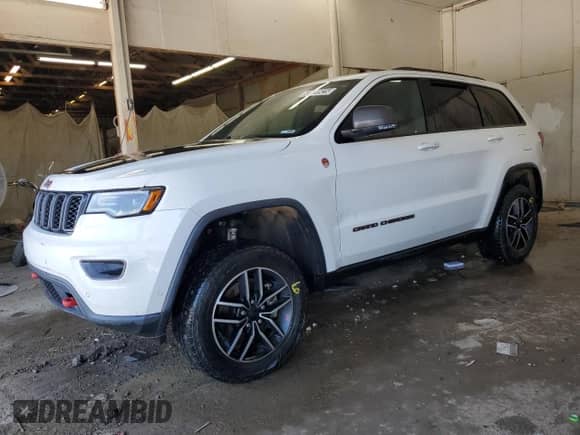 2021 Jeep Grand Cherokee Trailhawk z VIN 1C4RJFLG0MC868410, wystawiony jako Copart lot #63120925 z przebiegiem 140 986 mil mil oraz Czysty tytuł • Clean title. Historia ofert i sprzedaży dostępna na DreamBid. Obrazek 1.