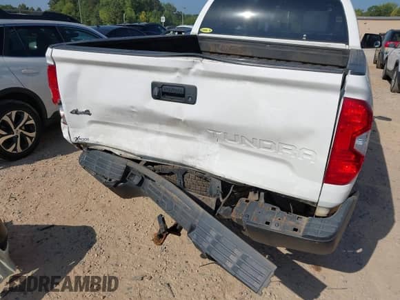 2020 Toyota Tundra SR with VIN 5TFUY5F14LX919793, listed as a IAAI auction lot 42782094 with 164,781 mi miles and . Bid and sale history available at DreamBid. Image 6.