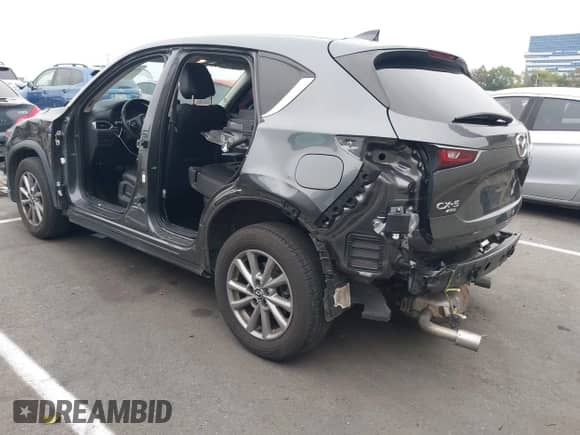 2022 Mazda CX-5 S Select z VIN JM3KFBBM2N0573466, wystawiony jako IAAI lot #42604117 z przebiegiem 35 729 mil mil oraz . Historia ofert i sprzedaży dostępna na DreamBid. Obrazek 3.