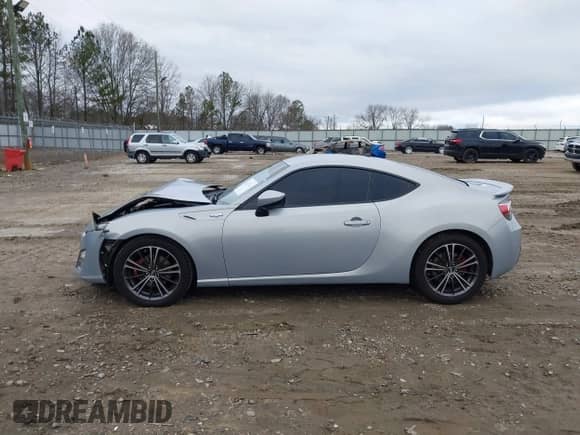 2013 Scion FR-S z VIN JF1ZNAA15D2729908, wystawiony jako IAAI lot #41270951 z przebiegiem 140 688 mil mil oraz . Historia ofert i sprzedaży dostępna na DreamBid. Obrazek 14.