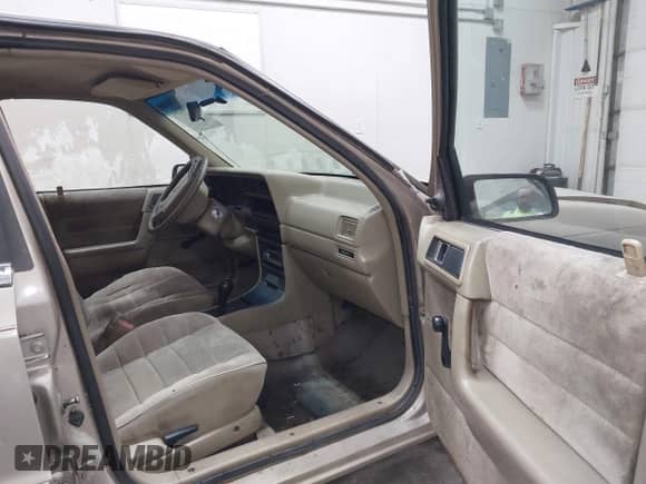 1991 Dodge Spirit with VIN 1B3XA46KXMF519542, listed as a IAAI auction lot 42278204 with 134,919 mi miles and . Bid and sale history available at DreamBid. Image 5.