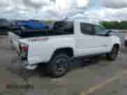 2020 Toyota Tacoma TRD Off Road с VIN 3TMCZ5AN4LM323432, выставлен на аукционе Copart как лот 59711425 с пробегом 46 664 миль миль и Списание • Salvage title. История ставок и продаж доступна на DreamBid. Изображение 3.