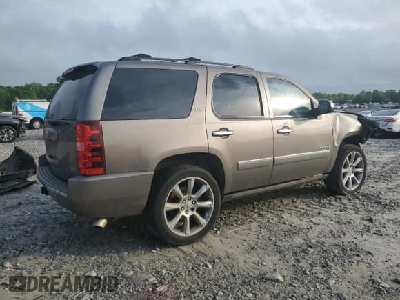 2012 Chevrolet Tahoe LTZ с VIN 1GNSCCE0XCR110507, выставлен на аукционе Copart как лот 54269535 с пробегом 193 499 миль миль и Списание • Salvage title. История ставок и продаж доступна на DreamBid. Изображение 3.