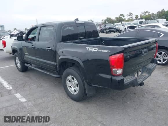 2017 Toyota Tacoma SR5 with VIN 3TMAZ5CN4HM047698, listed as a IAAI auction lot 42465382 with 132,297 mi miles and . Bid and sale history available at DreamBid. Image 3.