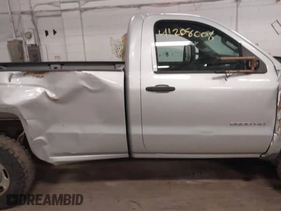 2015 Chevrolet Silverado 2500HD Work Truck with VIN 1GC0KUEG8FZ109107, listed as a IAAI auction lot 41208008 with 161,539 mi miles and . Bid and sale history available at DreamBid. Image 13.