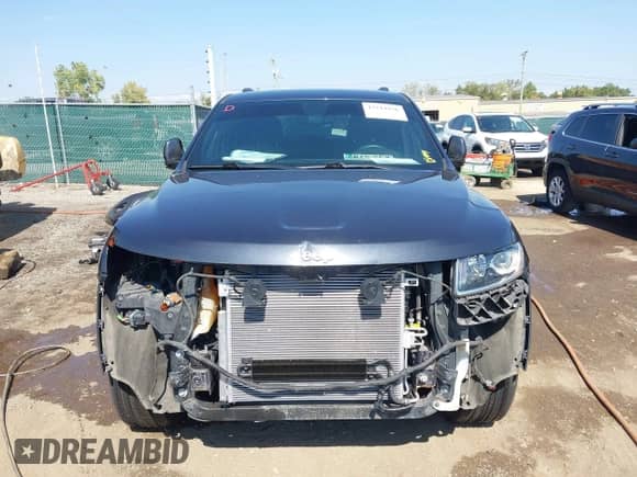 2015 Jeep Grand Cherokee Altitude with VIN 1C4RJFAGXFC207893, listed as a IAAI auction lot 43244156 with 131,514 mi miles and . Bid and sale history available at DreamBid. Image 13.