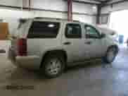 2009 Chevrolet Tahoe LS z VIN 1GNFC13C09R276501, wystawiony jako Copart lot #51229125 z przebiegiem 243 198 mil mil oraz Szkoda całkowita • Salvage title. Historia ofert i sprzedaży dostępna na DreamBid. Obrazek 3.
