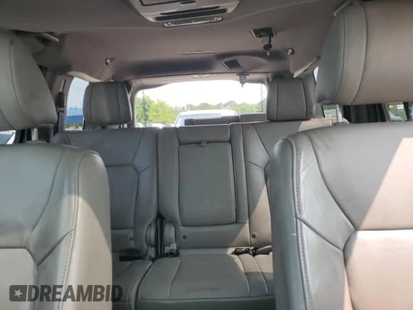 2015 Honda Pilot Touring с VIN 5FNYF3H96FB011875, выставлен на аукционе Copart как лот 59057085 с пробегом 165 328 миль миль и Списание • Salvage title. История ставок и продаж доступна на DreamBid. Изображение 10.