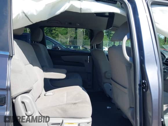 2016 Honda Odyssey LX с VIN 5FNRL5H28GB015794, выставлен на аукционе IAAI как лот 43162539 с пробегом 166 163 миль миль и . История ставок и продаж доступна на DreamBid. Изображение 8.