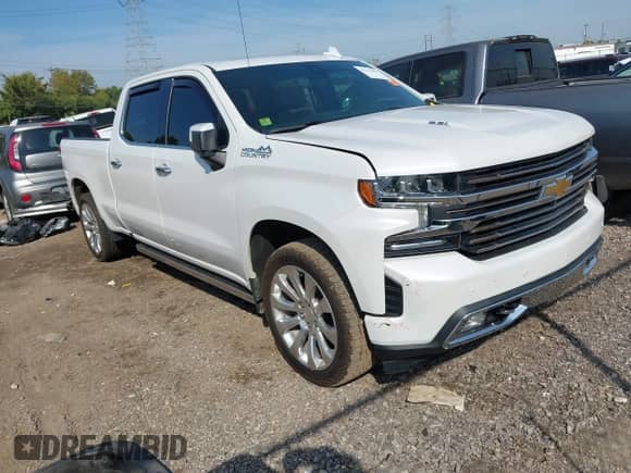 2021 Chevrolet Silverado 1500 High Country with VIN 1GCUYHEL3MZ272071, listed as a IAAI auction lot 43215932 with 113,190 mi miles and . Bid and sale history available at DreamBid. Image 1.