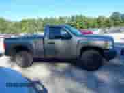 2013 Chevrolet Silverado 1500 Work Truck z VIN 1GCNCPEX1DZ359158, wystawiony jako IAAI lot #43131471 z przebiegiem 128 926 mil mil oraz . Historia ofert i sprzedaży dostępna na DreamBid. Obrazek 13.